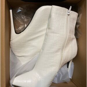 White faux crocodile heeled boots